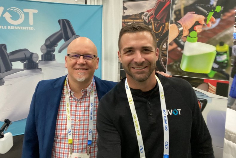 Brad and Tyler at a PIVOT trade show booth
